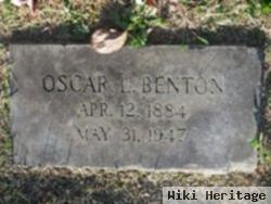 Oscar L Benton