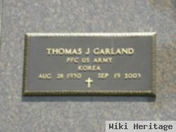 Thomas J Garland