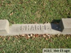 C. (O. T.) F. Sharpe