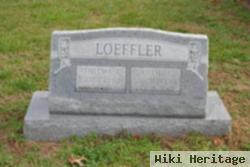 Adam E. Loeffler