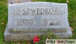 Raymond J Swedko