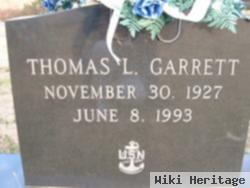 Thomas L Garrett