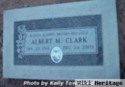 Albert M Clark