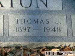 Thomas J Laxton