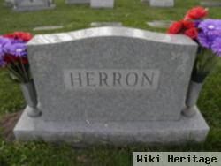 Byron M Herron