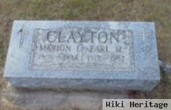 Earl M Clayton