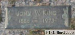 John W King