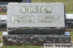 James E Busek