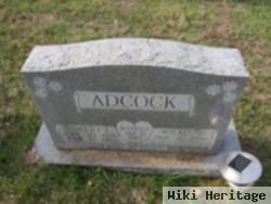 Robert L Adcock