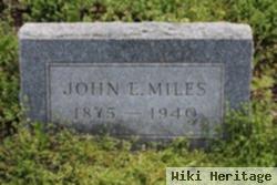 John E Miles