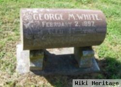 George M White