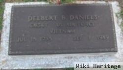 Delbert B Daniels