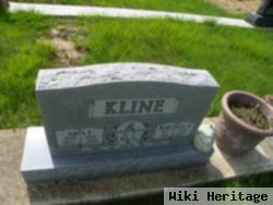 Amos F Kline