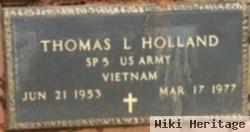 Thomas L Holland