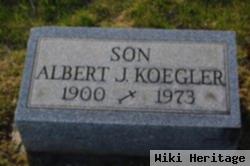 Albert J Koegler