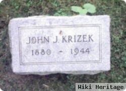 John J Krizek