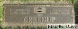 Wilbur E Greenup