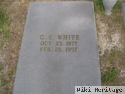 G E White