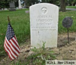 John M Simpson