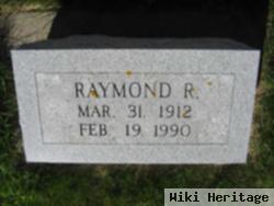 Raymond R Wolf