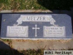 George E. Melzer