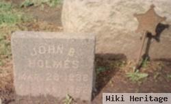 John B Holmes