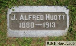 J Alfred Huott