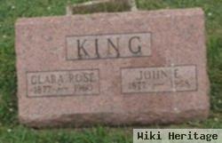 John E King