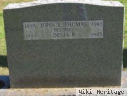 John E Thomas