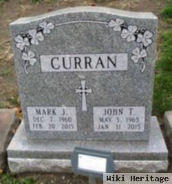 Mark J Curran