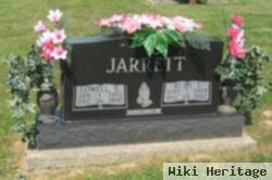 Lowell E Jarrett