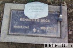 Kenneth E Buck