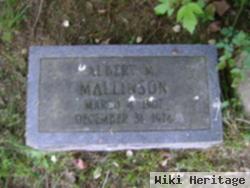 Albert M Mallinson