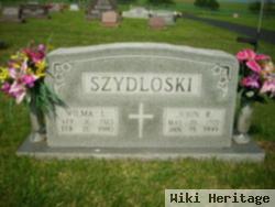 John R Szydloski