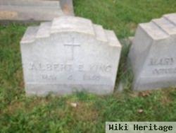 Albert E King