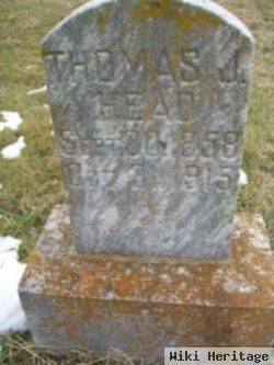 Thomas J Head