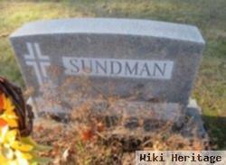 F Maynard Sundman