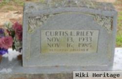 Curtis L Riley