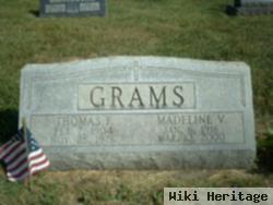 Thomas F Grams