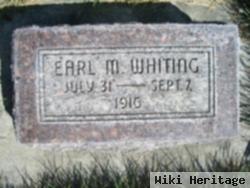 Earl M Whiting