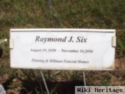 Raymond J. Six