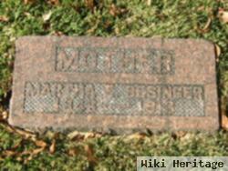 Martha E Besinger