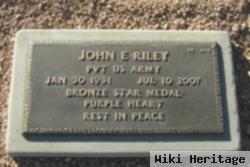 John E. Riley