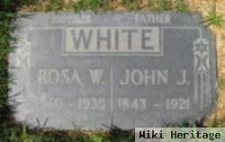 John J White