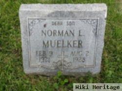 Norman L Muelker