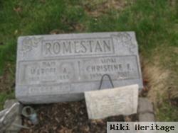 Christine E. Romestan