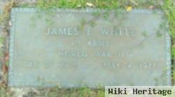 James E White