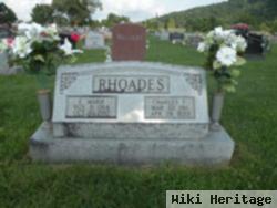 Charles F Rhoades