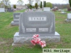 Claude F Tyner