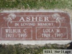 Lola M. Asher